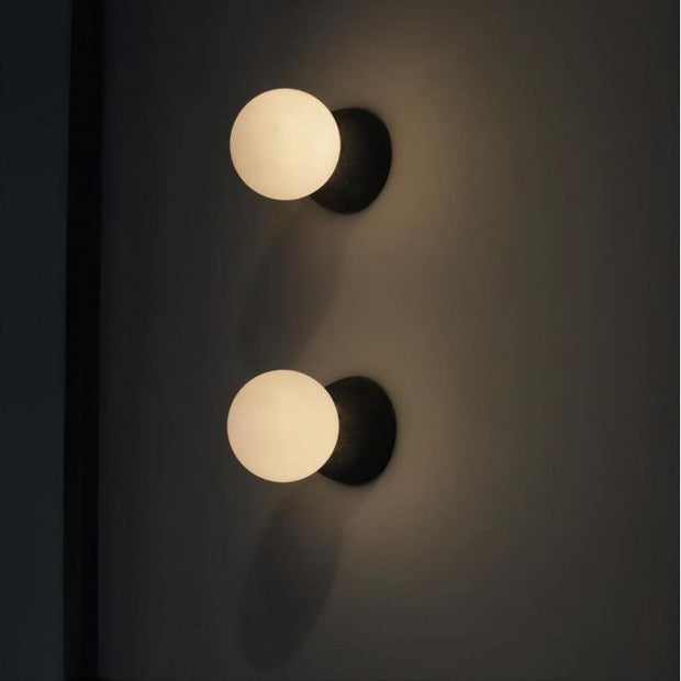 Dazzling geometric pendant light Origo – Made from volcanic stone and opal glass