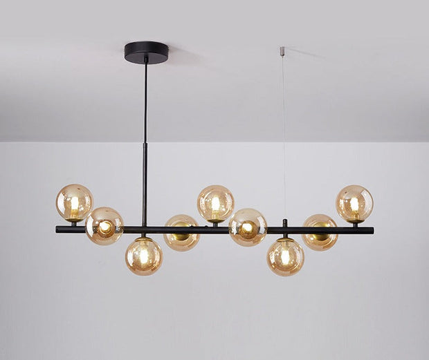 Suspension Sleek Armature – Élégance en verre et métal pour les espaces de restauration contemporains