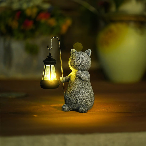 Enchanted golden solar cat statue - Stunning outdoor decor with illuminating LED lights